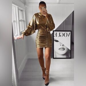 Brand new Fashion Nova “Wanting More Ruched Mini Dress” - Gold
Size: XS